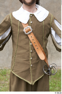  Photos Historical Musketeer in cloth armor 2 16th century Historical Musketeer Historical clothing brown jacket leather belt upper body white collar 0001.jpg
